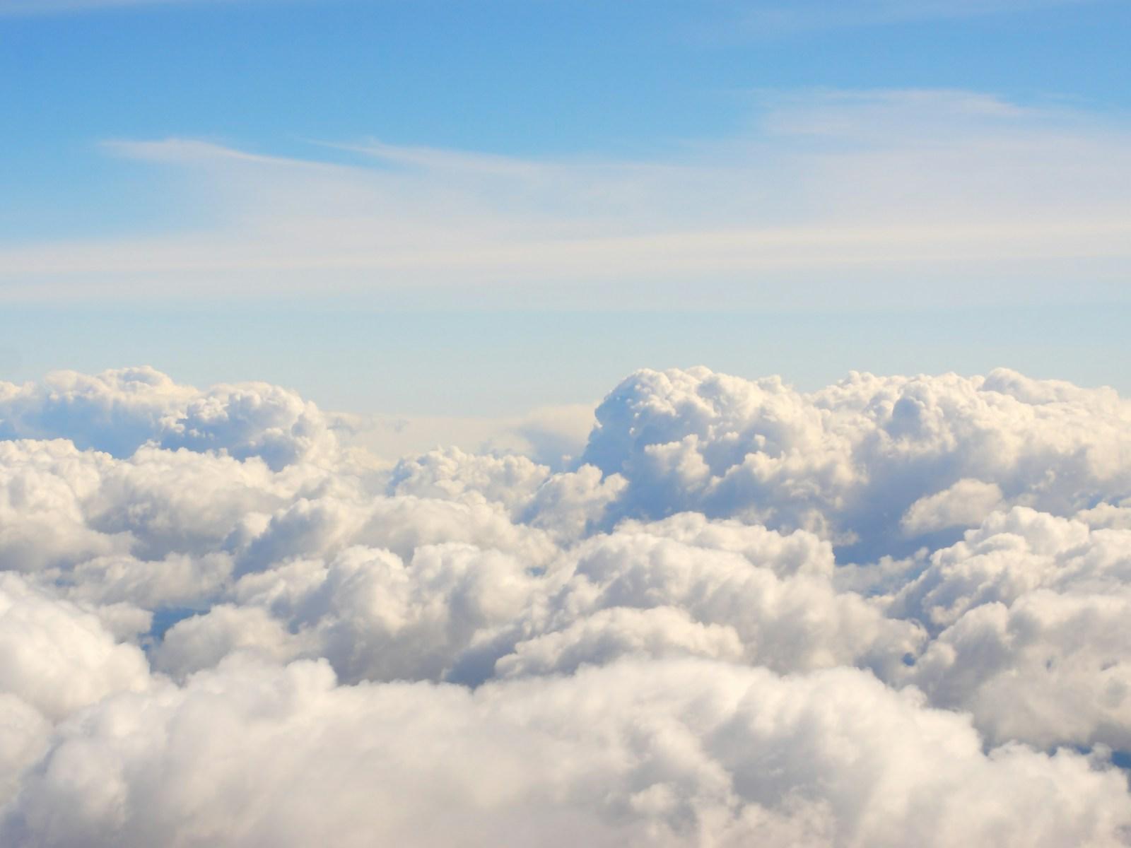 Fog rolling over coastal cliffs